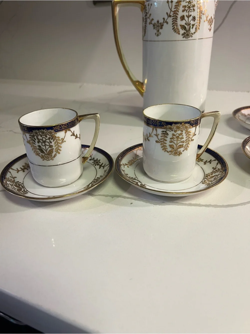 Elegant White Porcelain Coffee/Tea Set with Dark Blue and Gold Trim